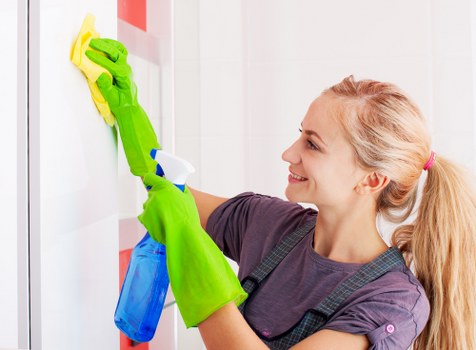 Professional Kennington cleaners working in a tidy home interior