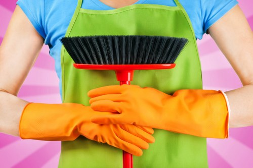 Close-up of oven racks being deep cleaned by a Kennington cleaning specialist