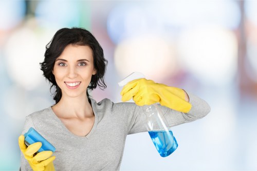 Professional cleaners in Kennington servicing a modern home interior
