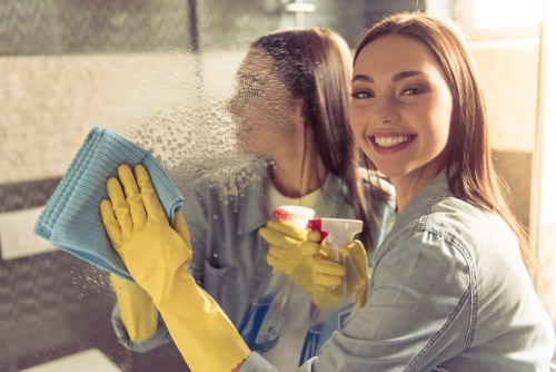 Professional clearance service sorting items in a Kennington property